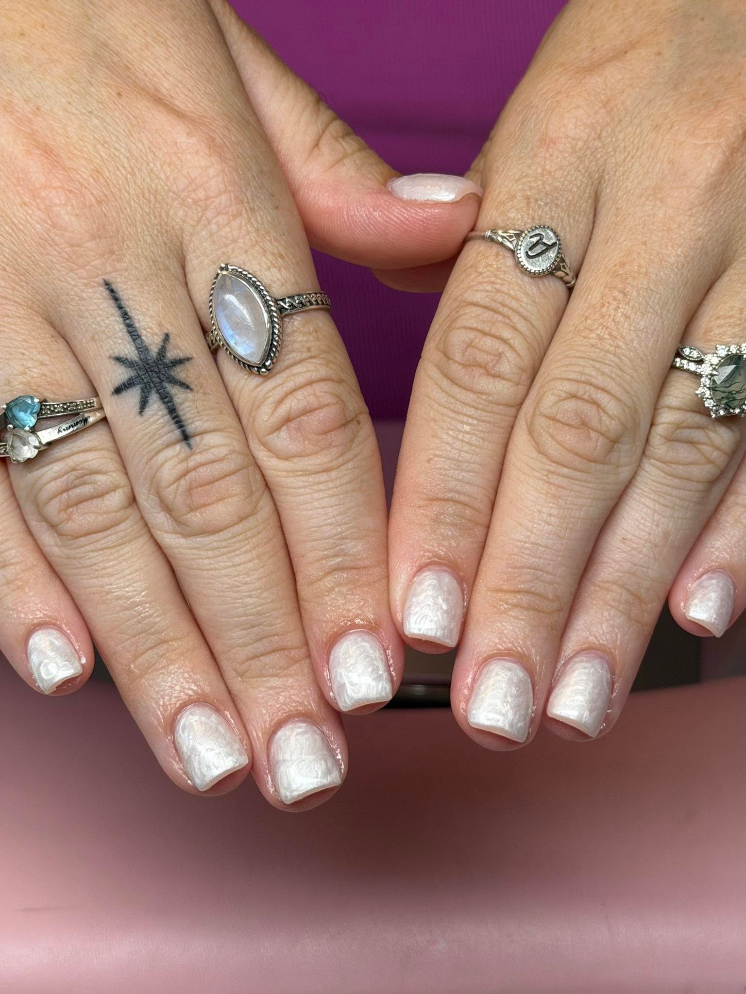 Pearlescent white shimmer manicure