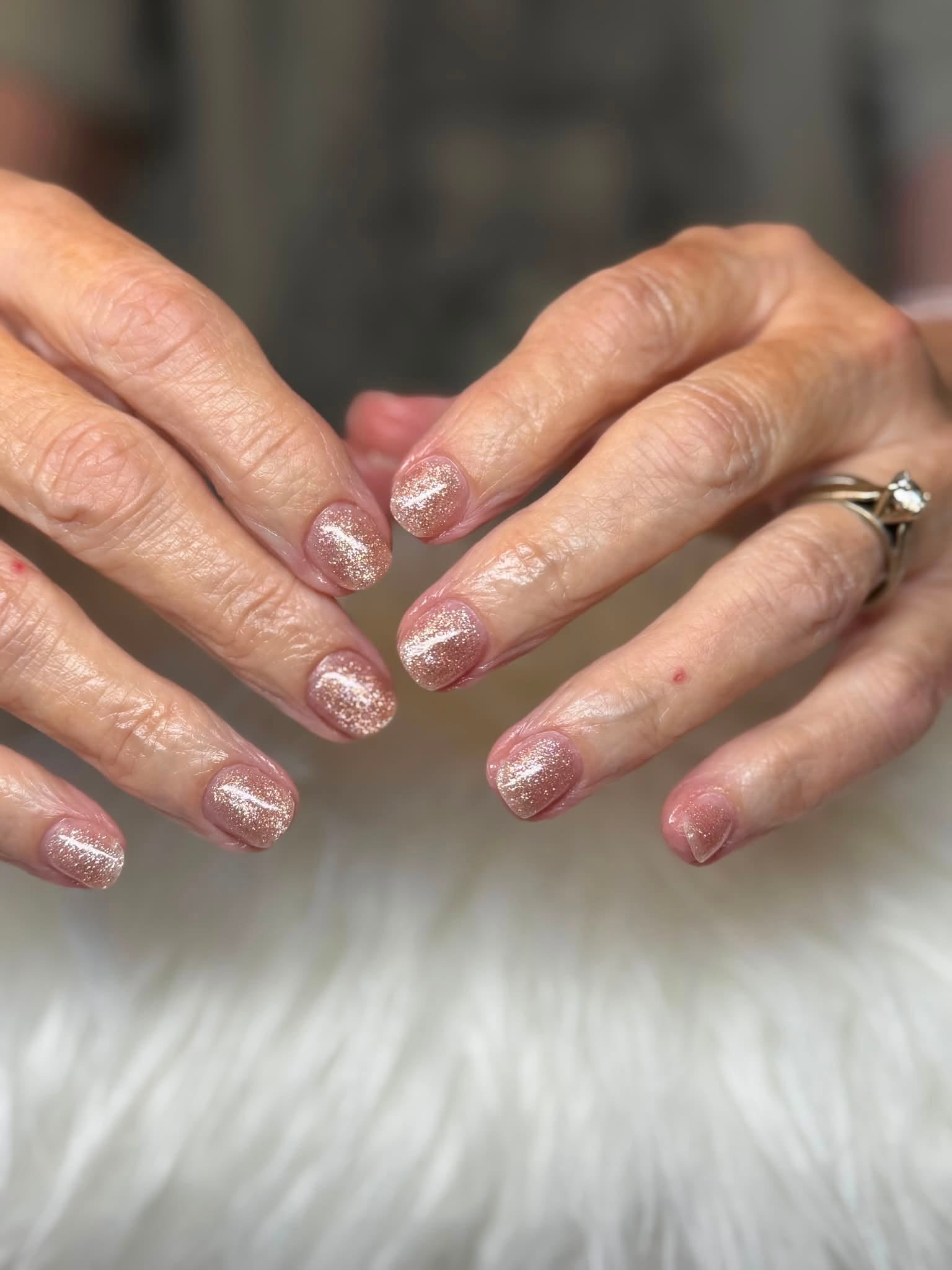 Nude gold glitter gel manicure