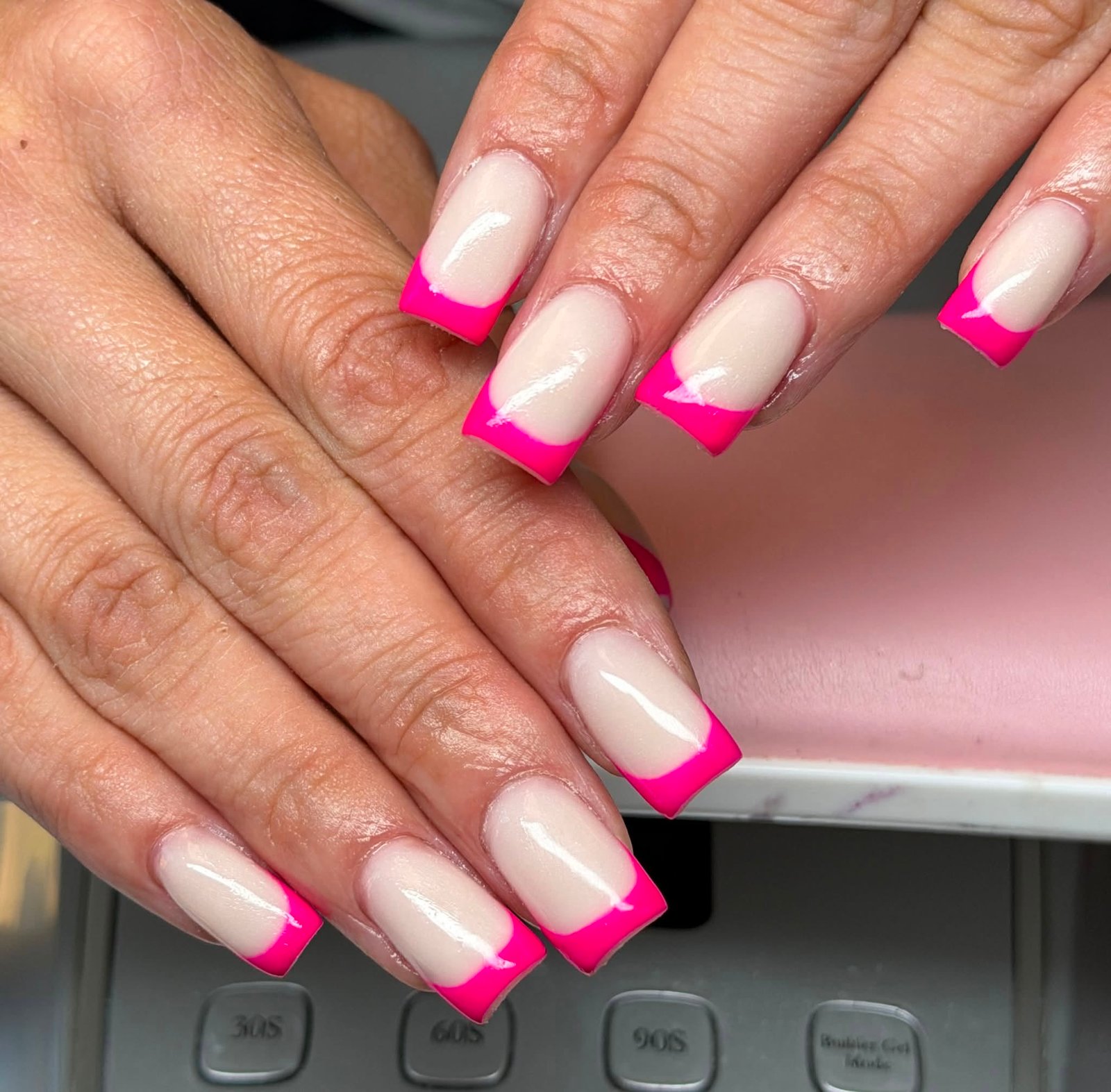 Hot pink French tip manicure