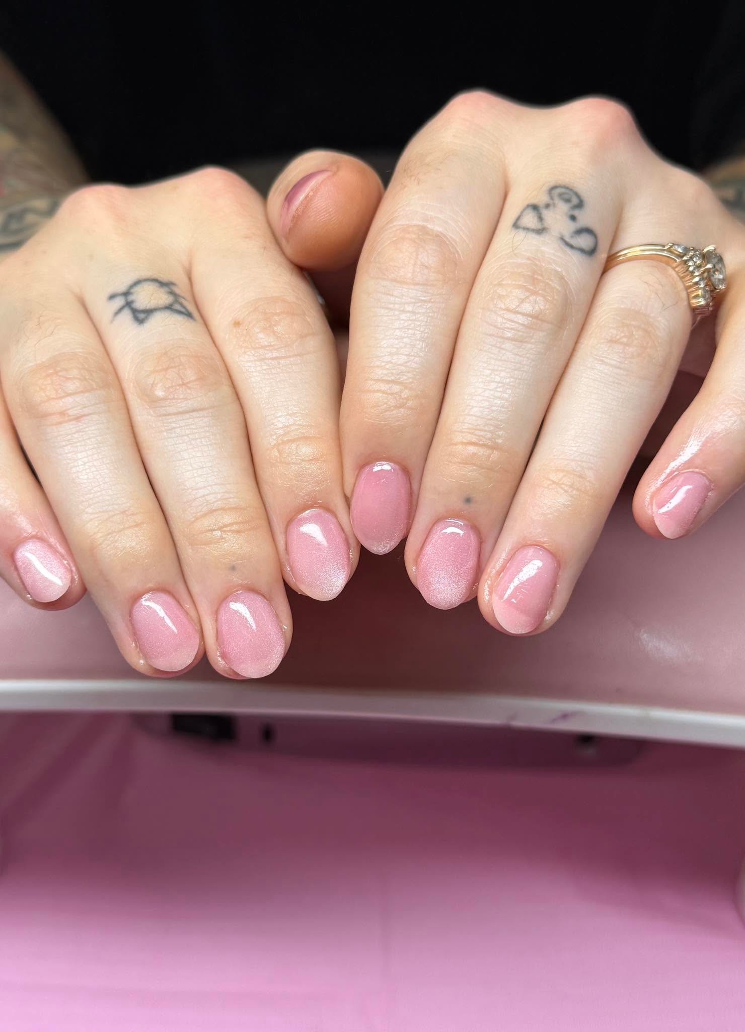 Soft pink shimmer gel manicure