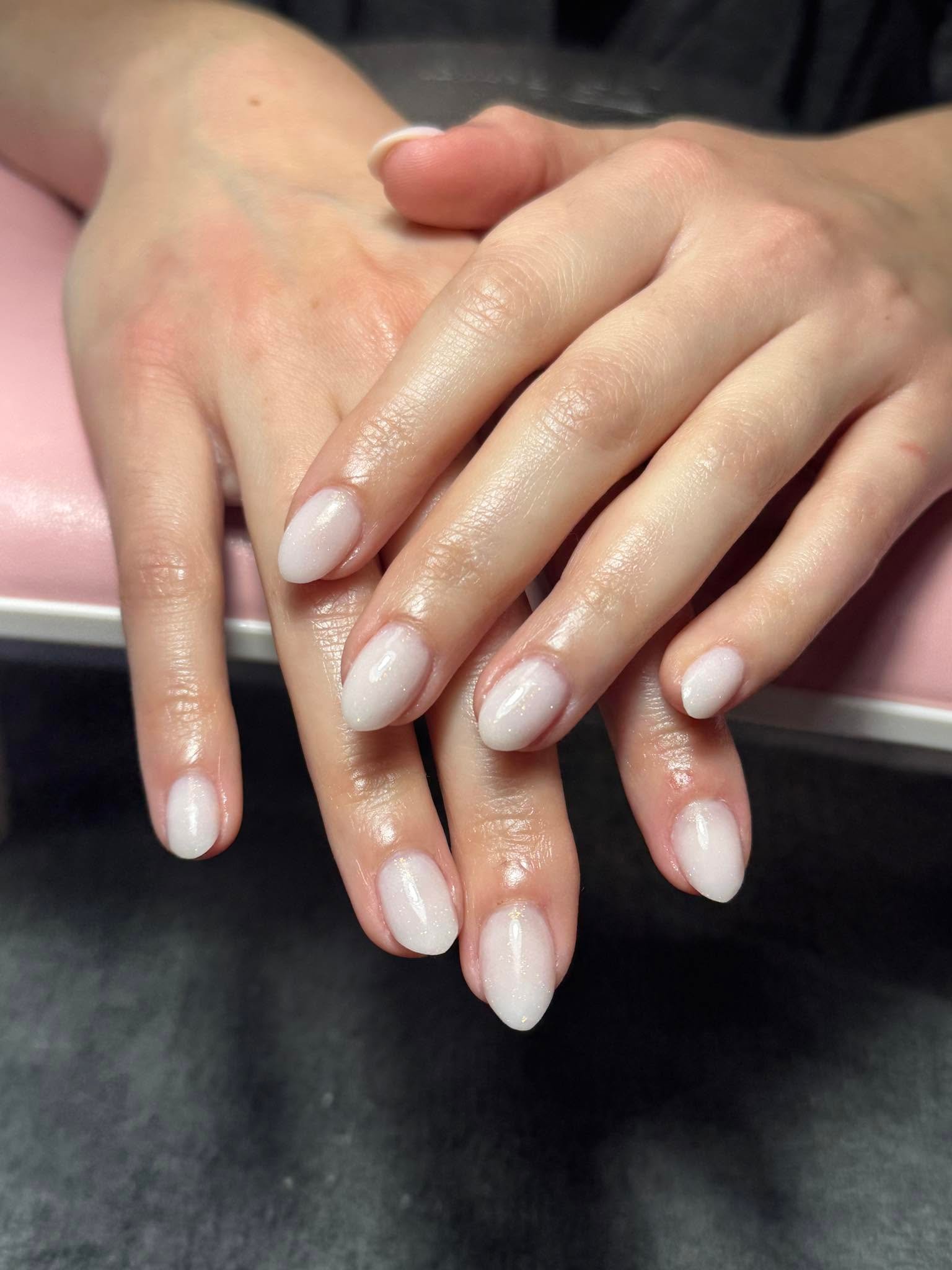 Iridescent white pearl shimmer gel manicure