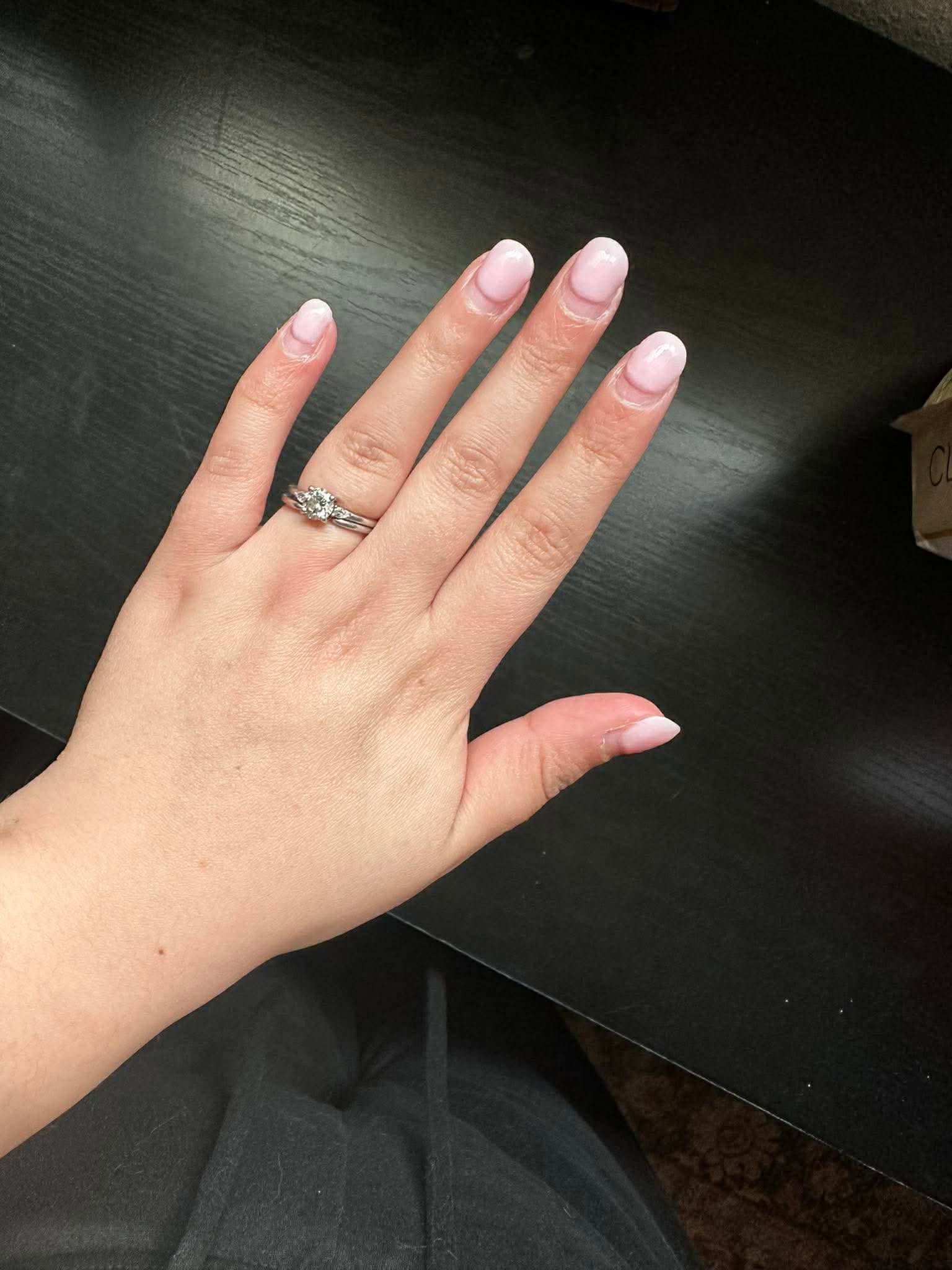 Pale sheer pink gel manicure with subtle shine