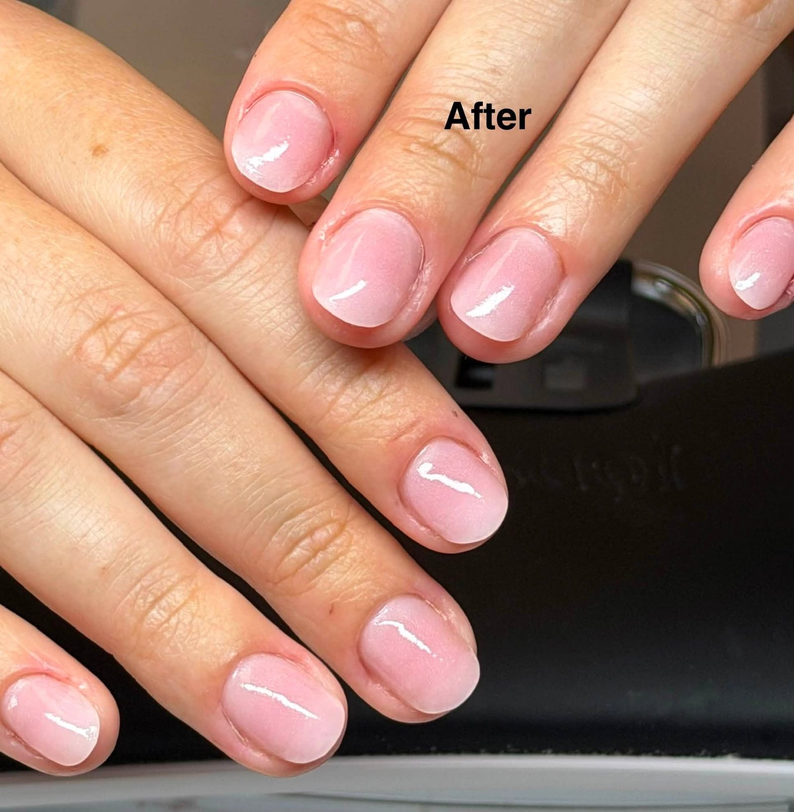 Sheer pale pink gel manicure with natural glossy finish