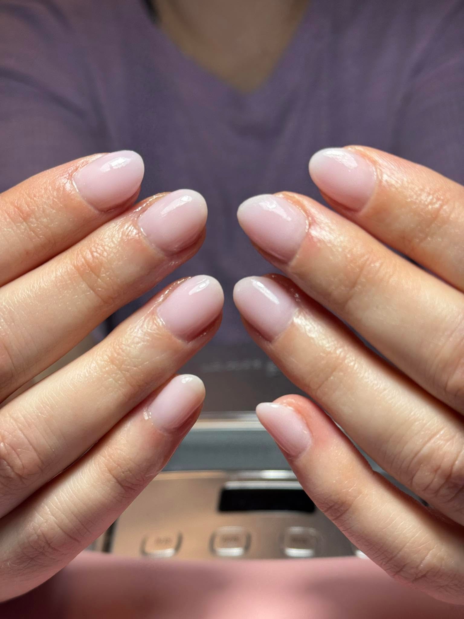 Very sheer pale pink solid gel manicure on short nails