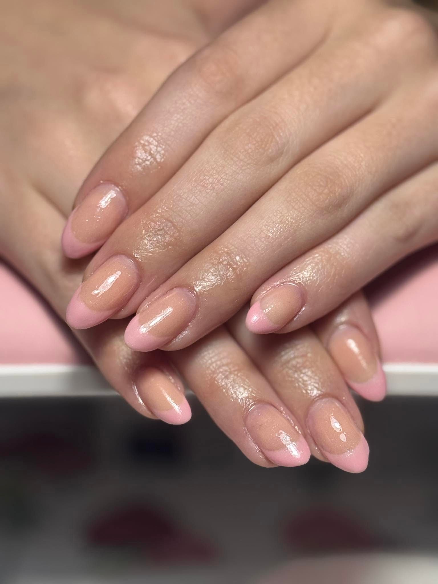 Sheer nude glossy almond nails