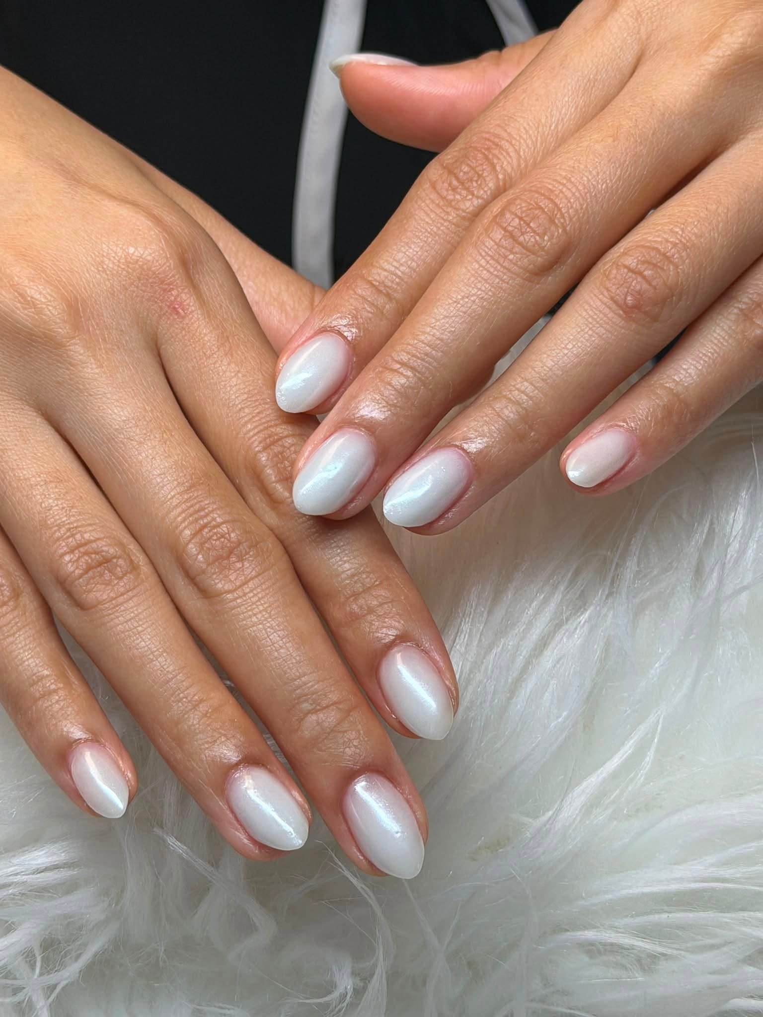 Pearly white glossy almond nails