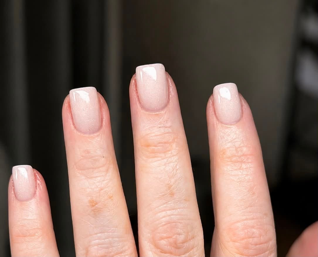 Pale shimmer nude gel manicure