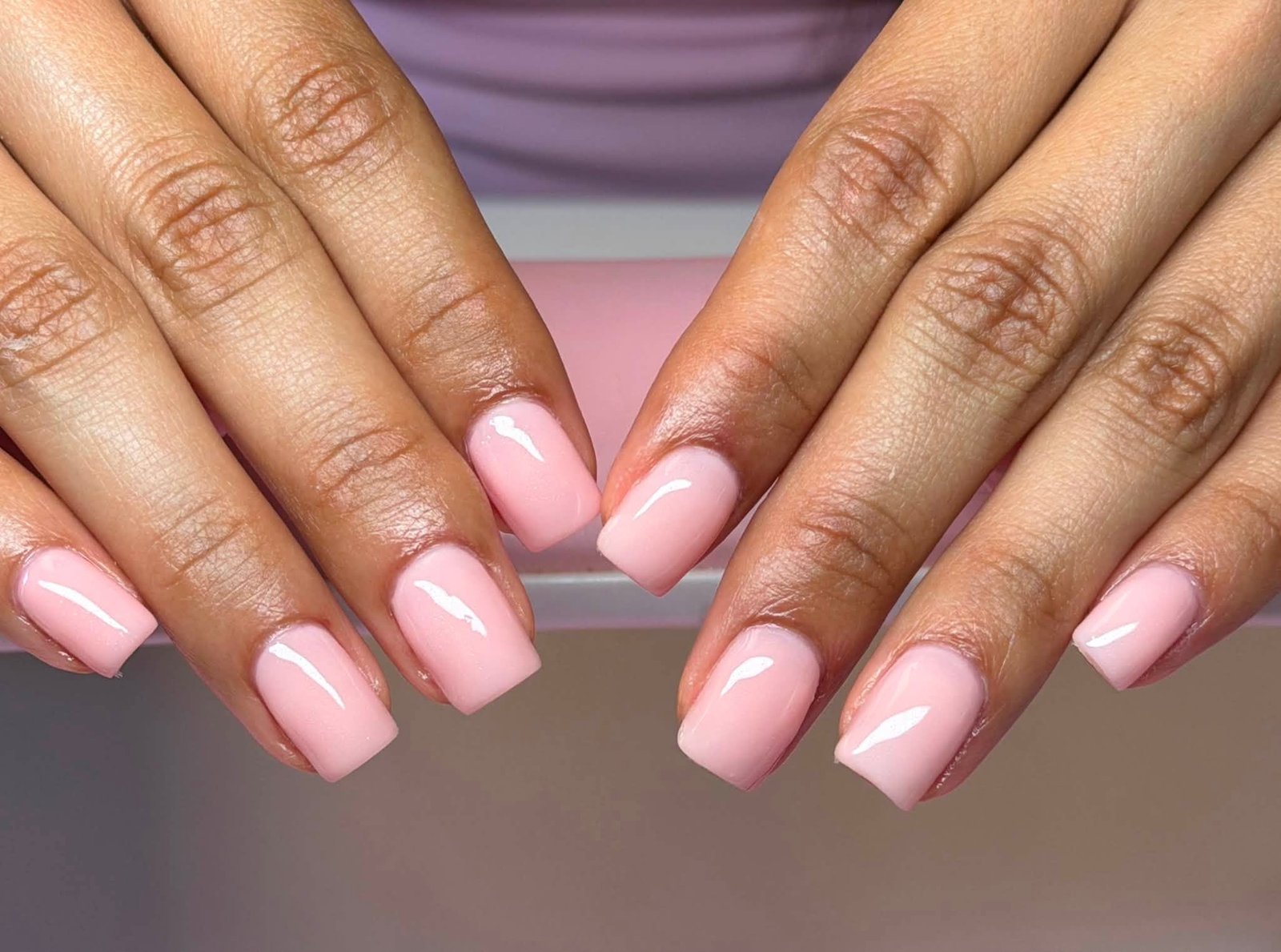 Pink glossy solid gel manicure