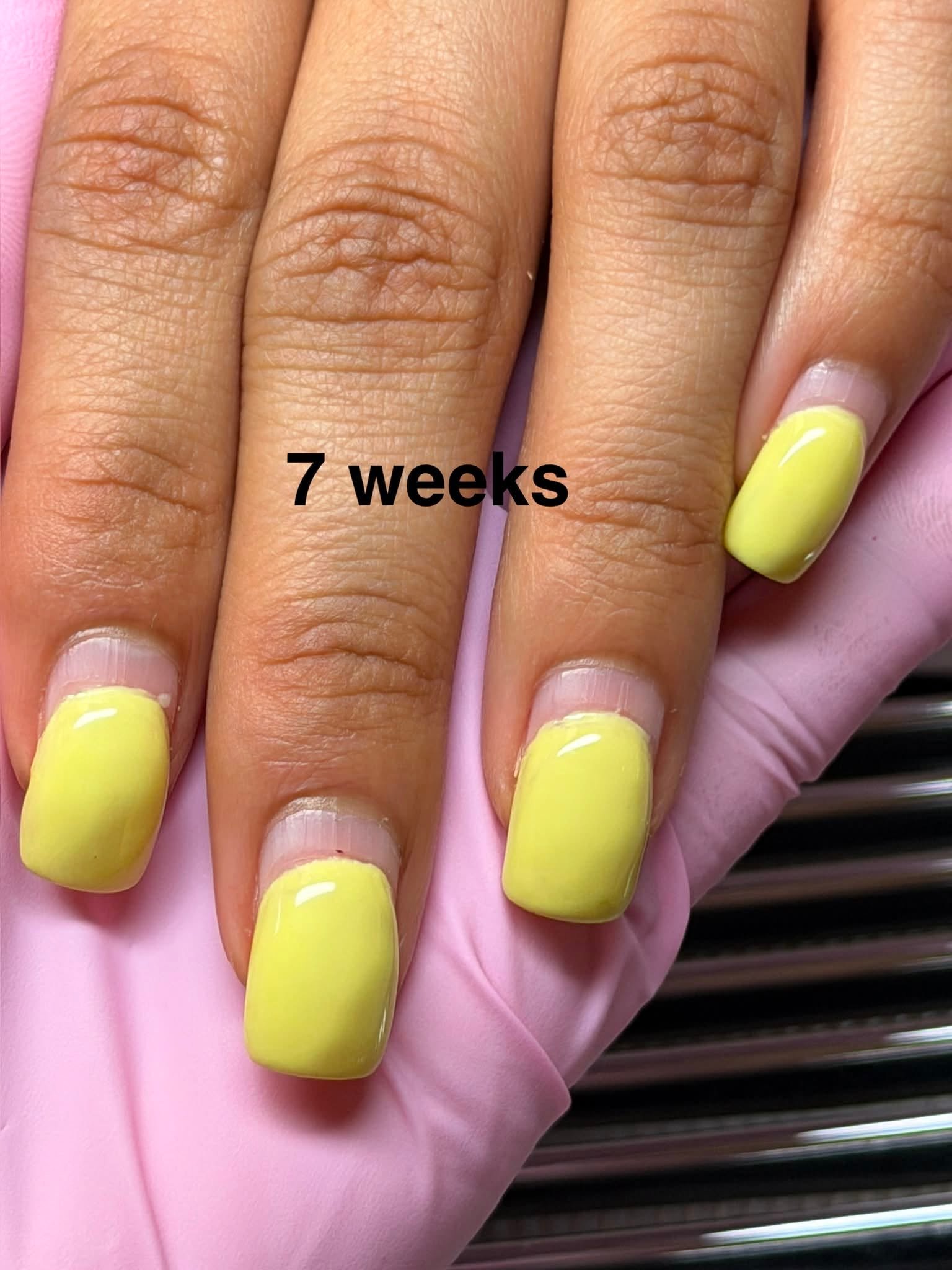 Pale yellow gel manicure