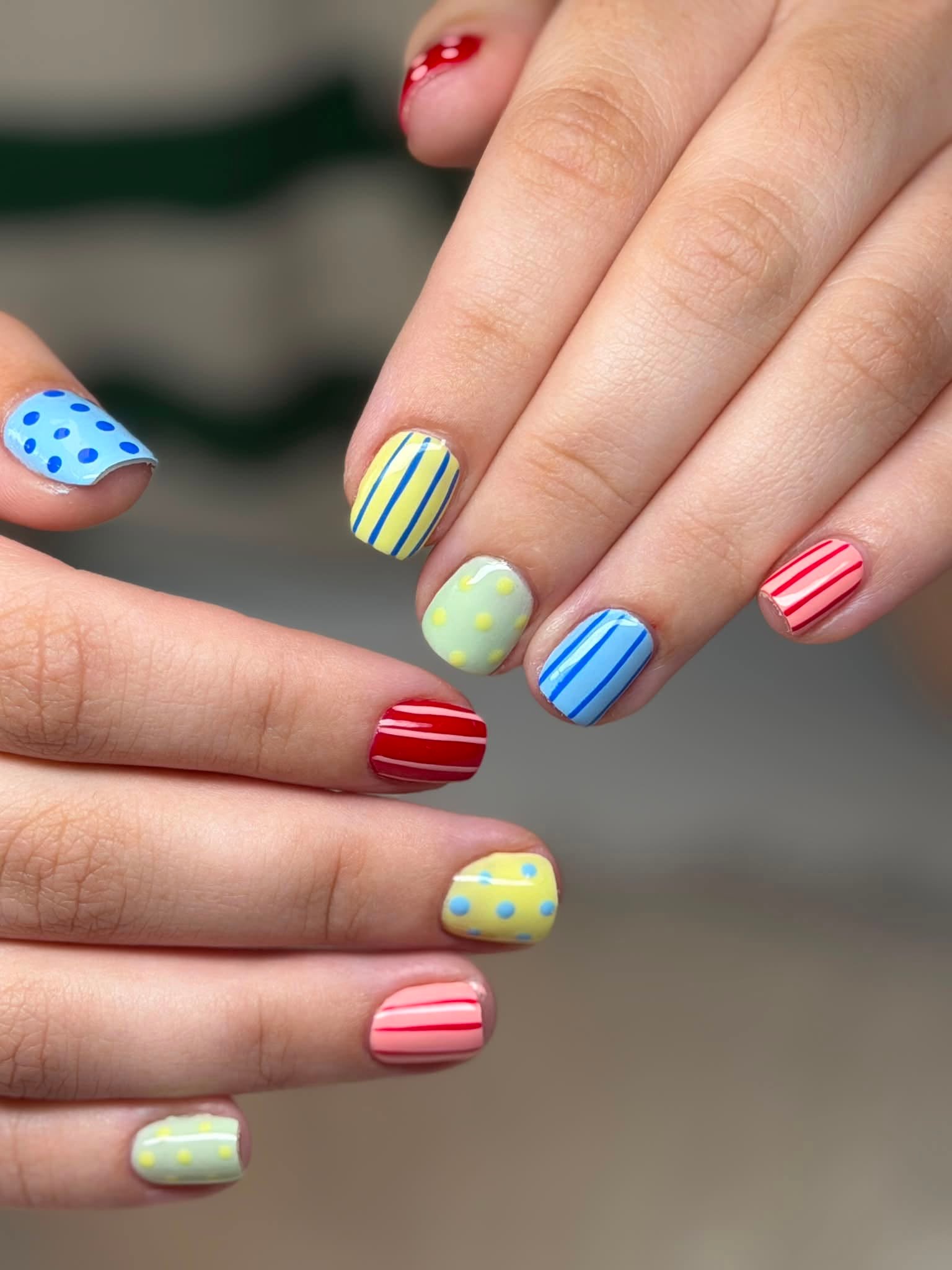 Mixed pastel nails with polka dots and stripes