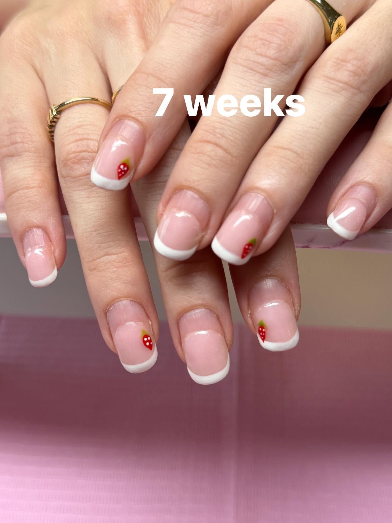 French tips with sweet hand-painted strawberry accents