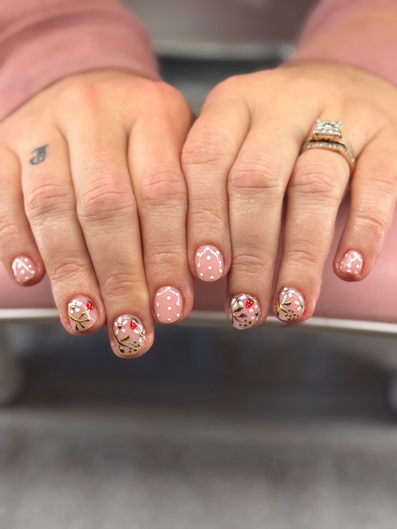 Nude nails with delicate floral vine and berry art