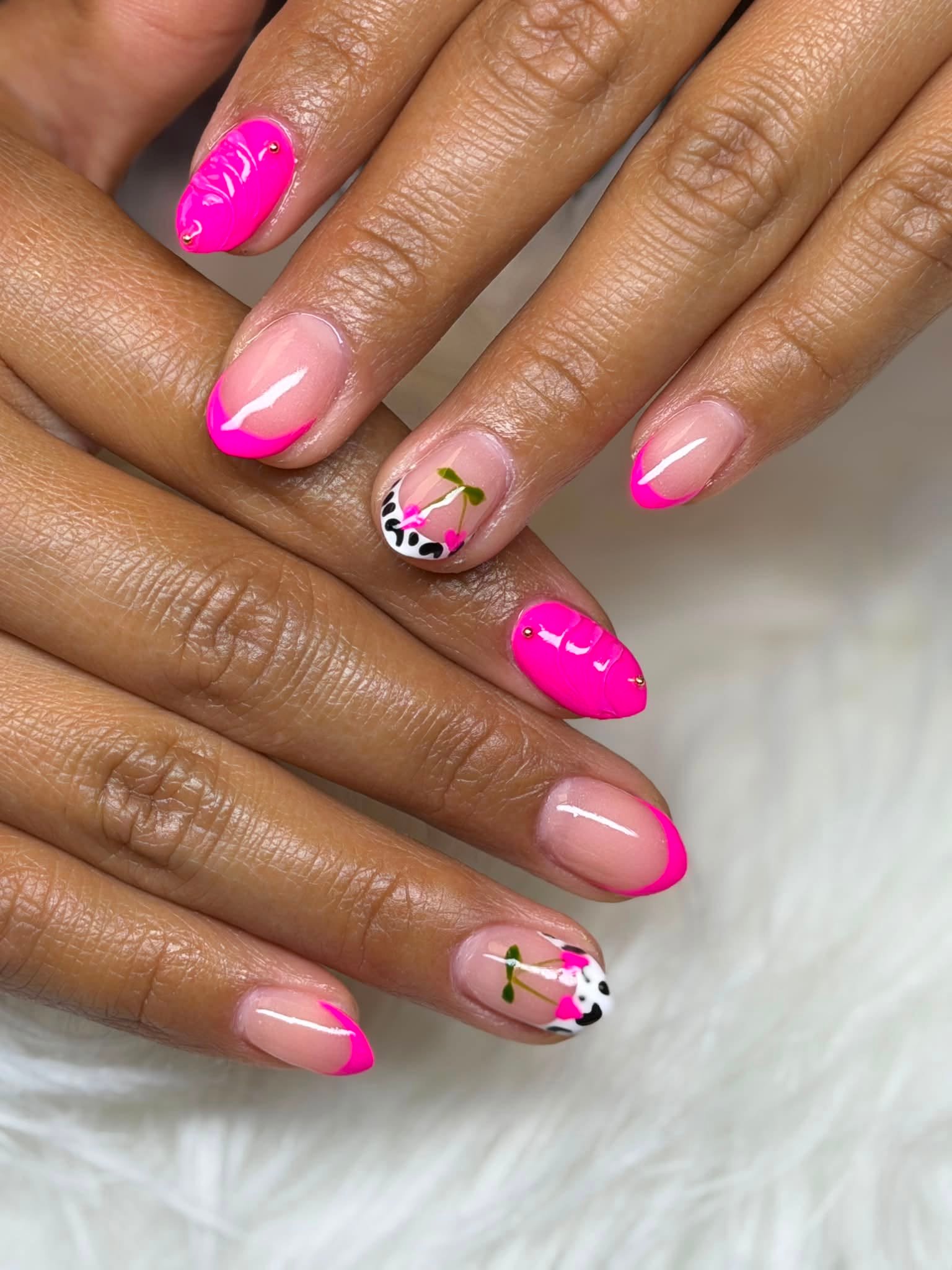 Hot pink French tips with leopard print and cherry art