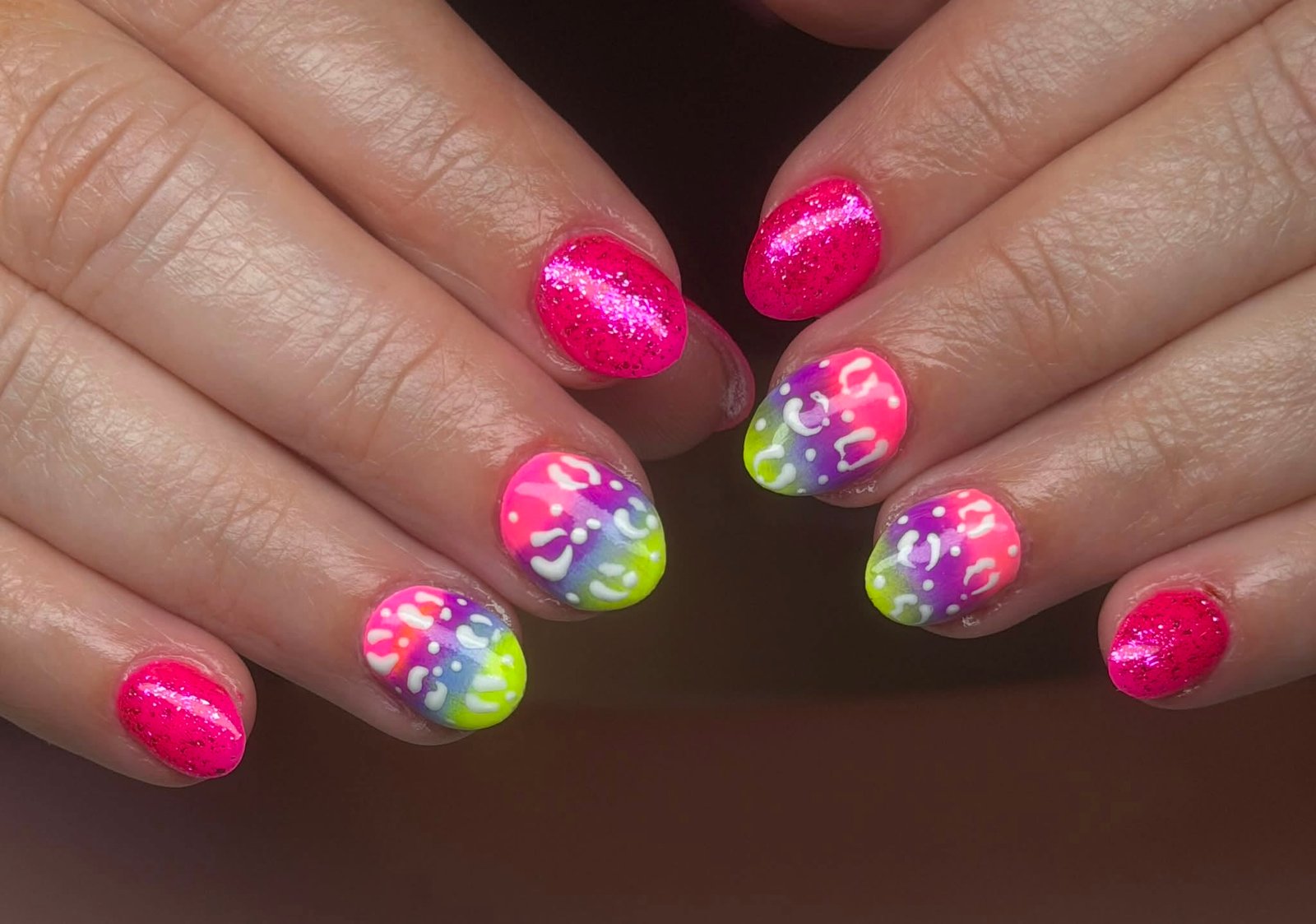 Neon tie-dye manicure with white line art