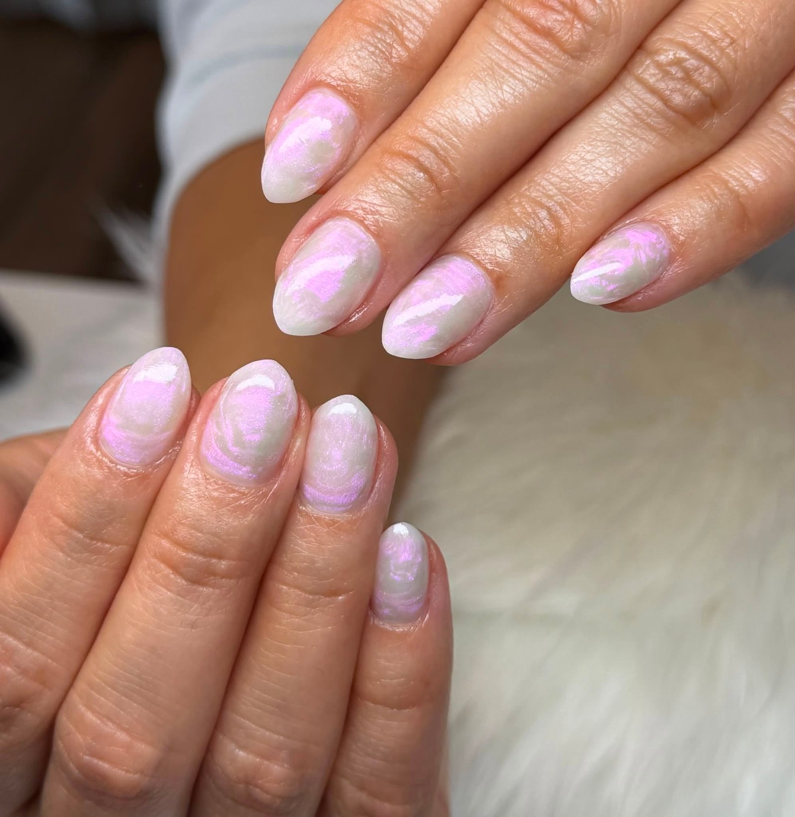 Pearl white and lilac marbled swirl manicure